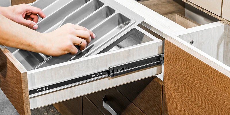 What is the difference between a drawer glide and a drawer slide?